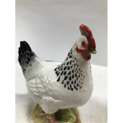 1100M - A John Beswick hand painted Sussex hen