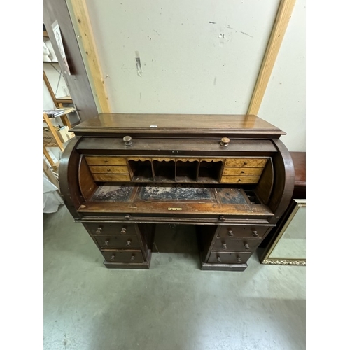 1696 - A late Victorian double pedestal dome top desk with pull-out slide