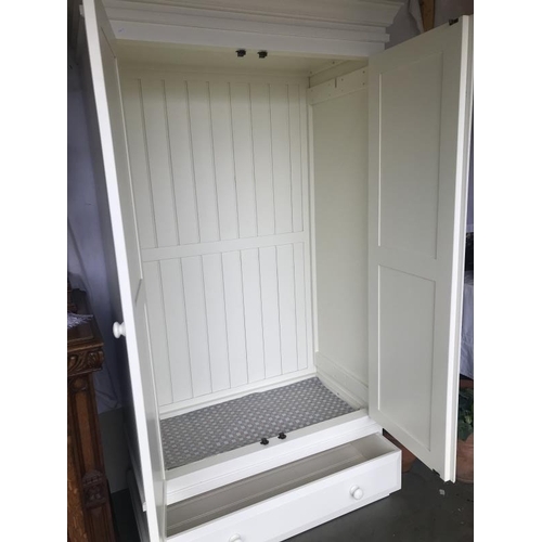 1700 - A white finished pine wardrobe