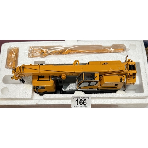 166 - A quantity of Construction vehicles by Conrad Liebherr, Norscot & Motor art etc