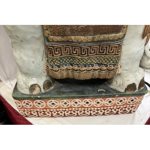 1498 - A late 19th/early 20th century ceramic elephant garden seat/pot stand