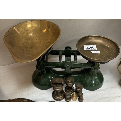 425 - A pair of cast iron kitchen scales with brass pans