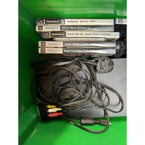 431 - A Playstation 2 with 2 controllers & A quantity of games