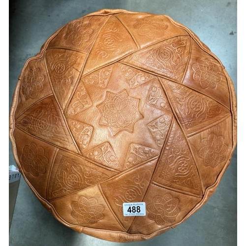 488 - A leather pouffe