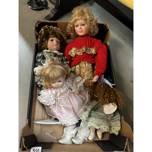 510 - A collection of porcelain head dolls