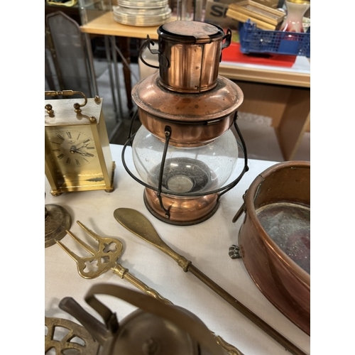 518 - A quantity of copper and brass items