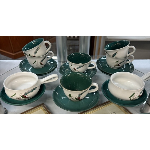 539 - A large lot of Denby cups, saucers & soup bowls etc 'Greenwheat' approximately 42 pieces