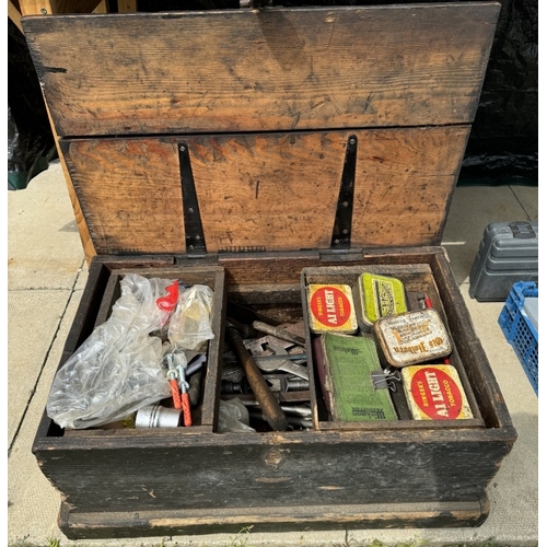 546 - A vintage wooden chest with a good assortment of tools