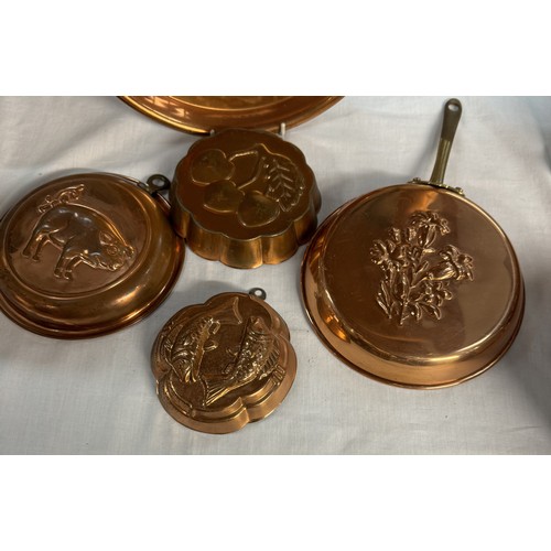 530 - 2 Copper wall pans & a tray