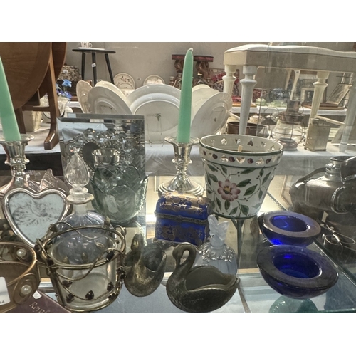 681 - A mixed lot including candles, candle holders, trinket box, perfume bottles etc