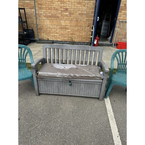 586 - A garden storage bench & 2 green garden armchairs