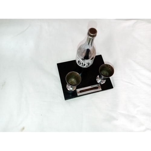 693 - An art deco striker lighter of a champagne bottle & goblets