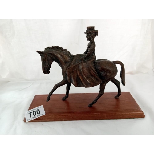 700 - A bronze Edwardian dressed lady on horse