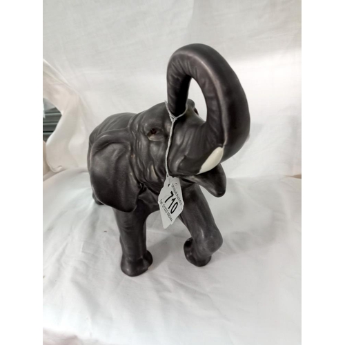 710 - A large unbranded pottery elephant