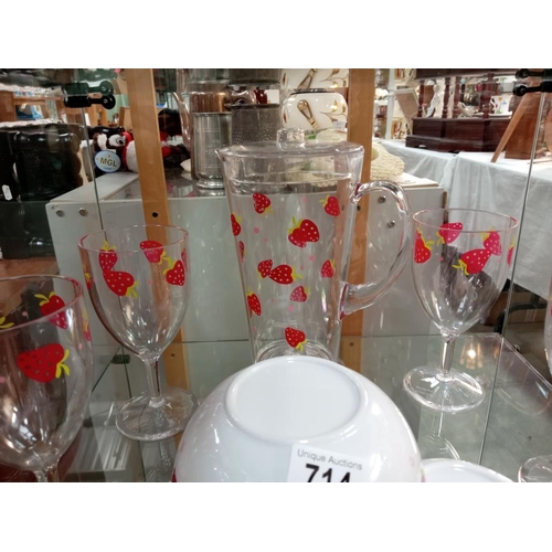 714 - A plastic strawberry pattern, drinks glasses, jug & 4 cereal bowls