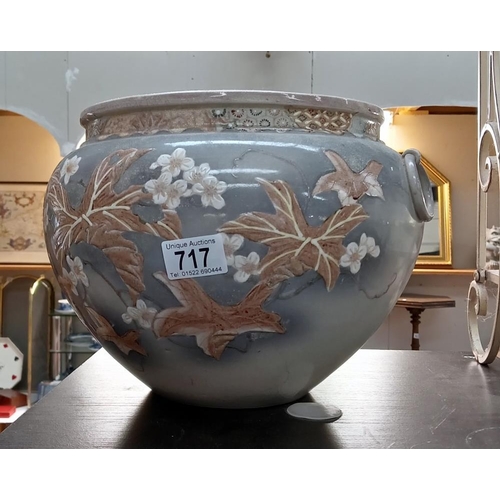 717 - A glazed planter with floral decoration (A/F Cracked)