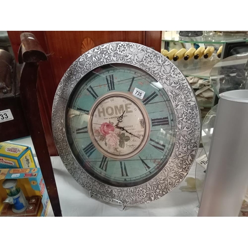 735 - A large decorative Quartz wall clock with hammered white metal rim, Diameter 56cm