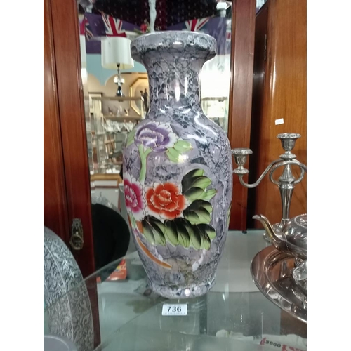 736 - An ornate vase