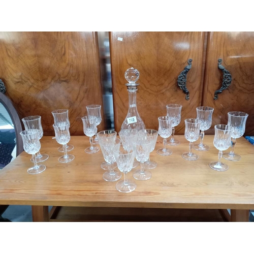 742 - A glass decanter with silver plated neck & a selection of glasses