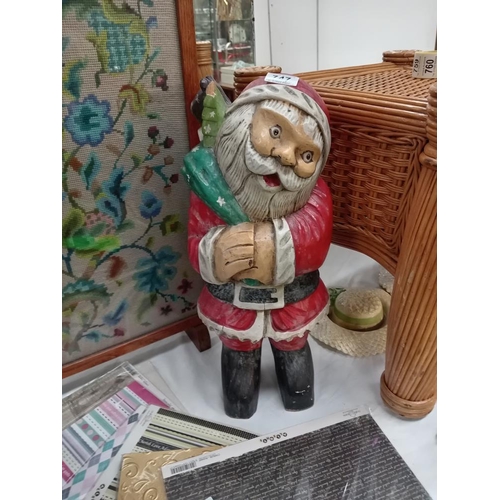 747 - A vintage wooden Santa Claus