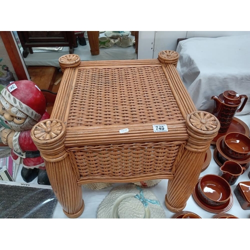 749 - A wicker tea table