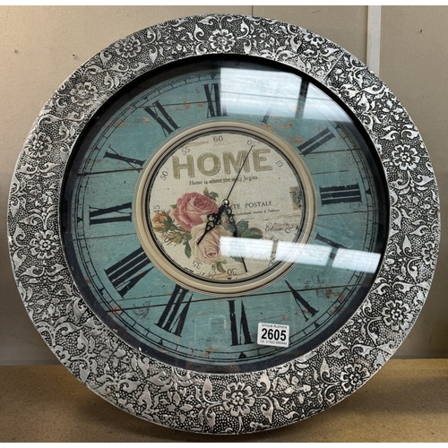 2605 - A large decorative wall clock