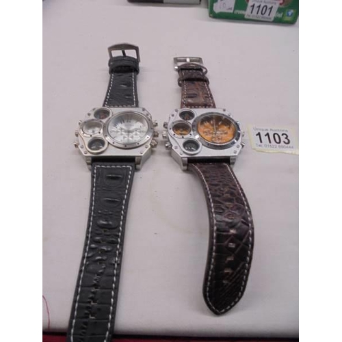 1103 - Two OULM multi-functional wrist watches, sold as seen.