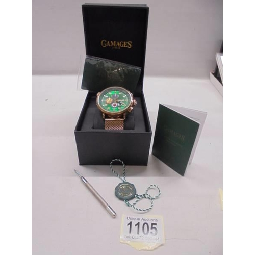 1105 - A boxed Gamages of London Aeronautical automatic wrist watch in working order.