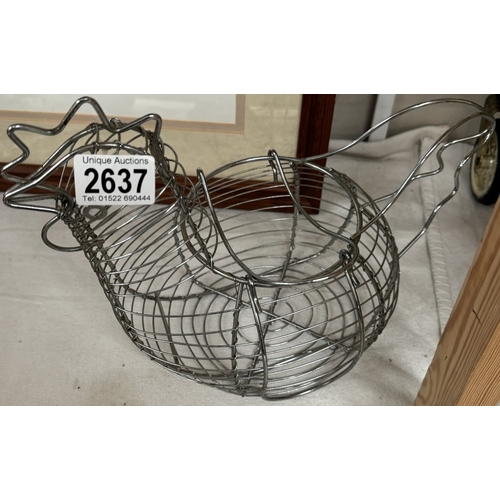 2637 - A cast iron cook book rest & chicken egg basket