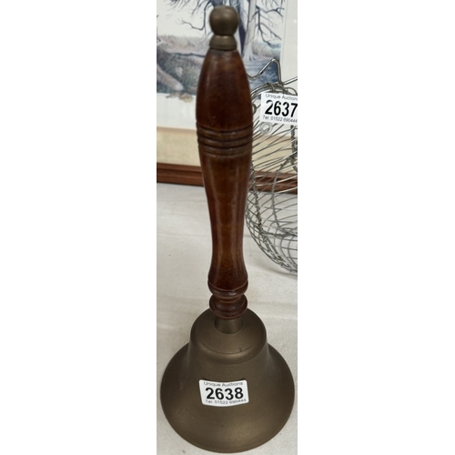 2638 - A brass hand bell with wooden handle