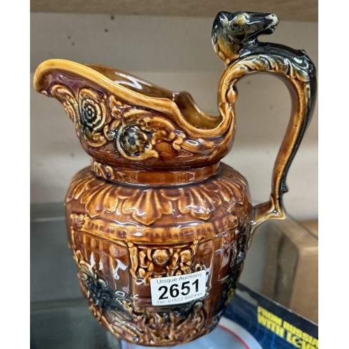 2651 - An Arthur Wood treacle glaze horse jug. Height 24.5cm