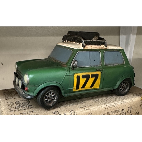 2664 - A boxed resin Shudehill racing mini & a large pressed steel mini