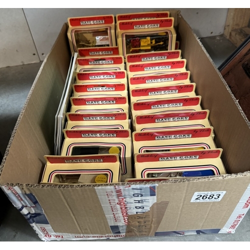 2683 - A large box of Lledo horse drawn vehicles