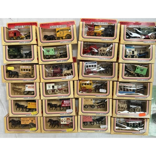 2683 - A large box of Lledo horse drawn vehicles