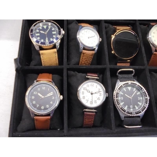 1113 - A case of twenty assorted gent's watches, some working (case lid damaged).