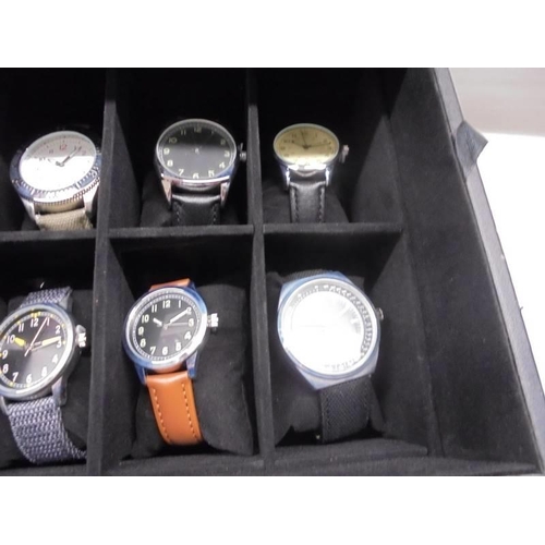 1113 - A case of twenty assorted gent's watches, some working (case lid damaged).