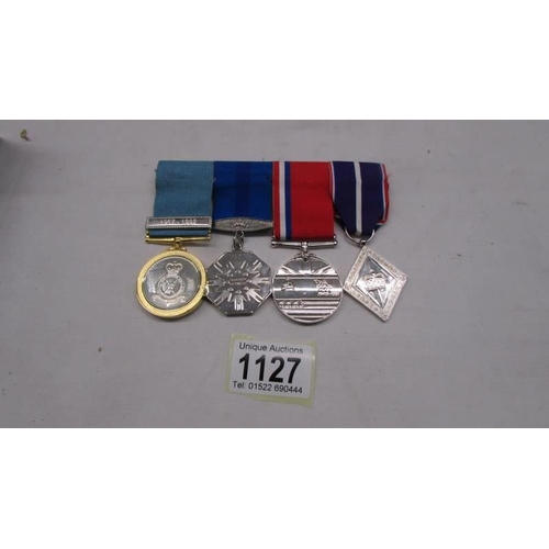 1127 - A bar of four medals - Three named for 04289090 Sgt D R Miller RAFR.