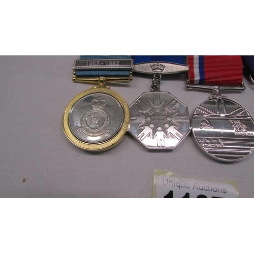 1127 - A bar of four medals - Three named for 04289090 Sgt D R Miller RAFR.