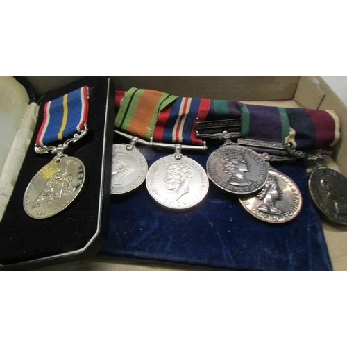 1129 - Two WW2 medals, Malaya, South Arabia, long service and national service medals.