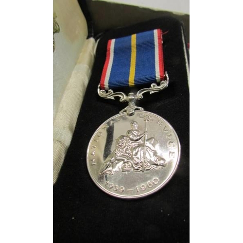 1129 - Two WW2 medals, Malaya, South Arabia, long service and national service medals.