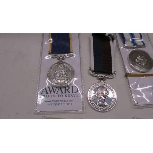 1130 - Four award medals including 65th anniversary and sapphire jubille and three miniature medals.