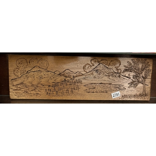 2791 - A large carved oak plaque image of Mount Fuji. 65cm x 20cm x 2.5cm approximately