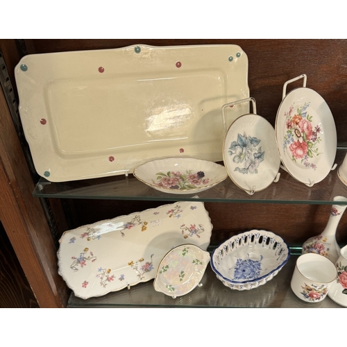 2792 - A selection of floral china including Fortnum & Mason preserve pot etc (2 shelves)