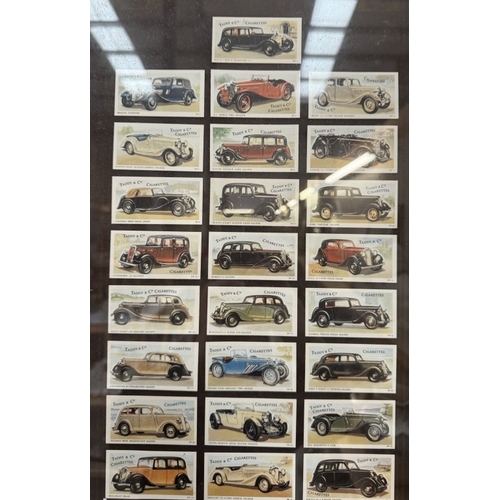 2825 - A framed set of reprint taddy & co cigarette cards of vintage cars