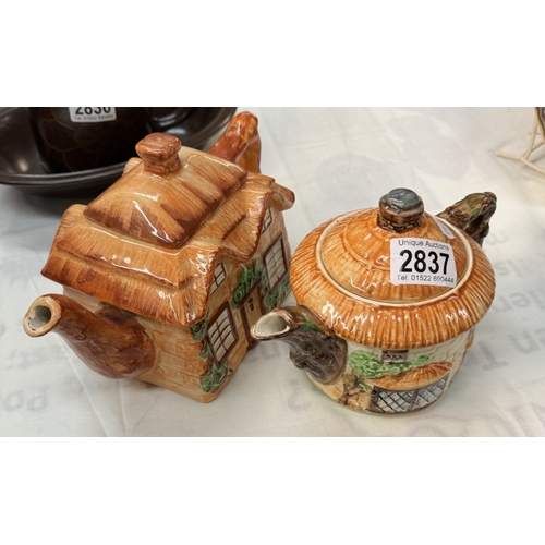 2837 - A Beswick cottage teapot & 1 other