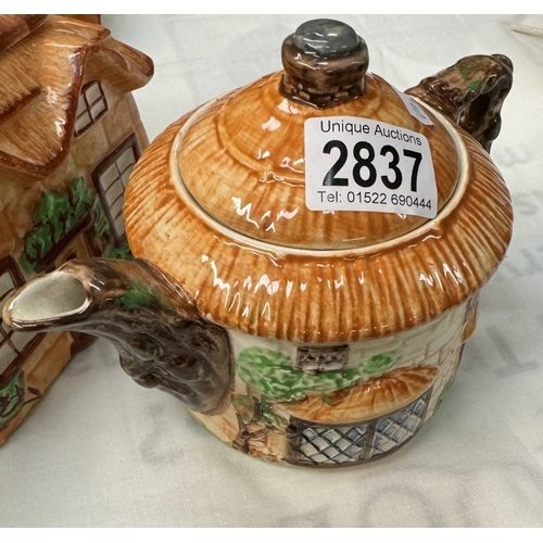 2837 - A Beswick cottage teapot & 1 other