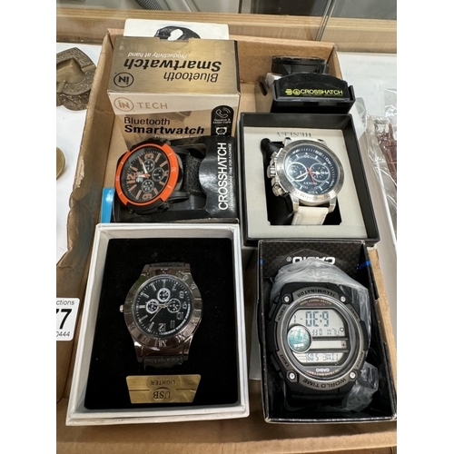 2877 - A quantity of wristwatches including 2 smart watches