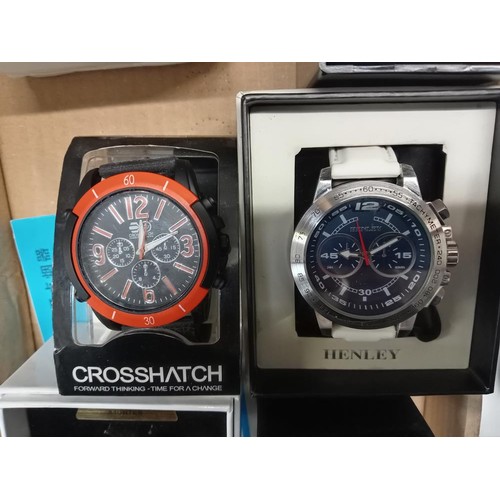 2877 - A quantity of wristwatches including 2 smart watches