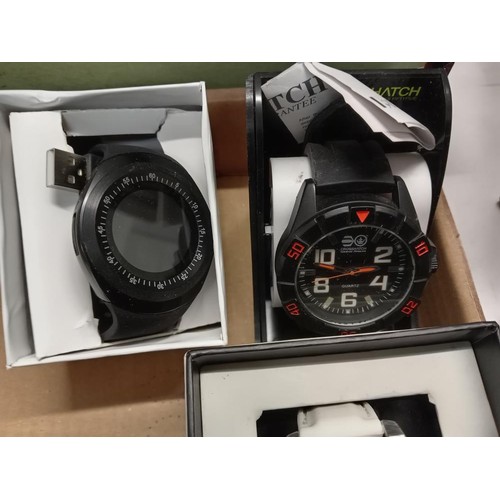 2877 - A quantity of wristwatches including 2 smart watches