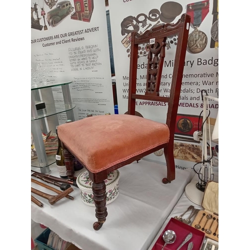 2894 - An Edwardian mahogany nursing chair